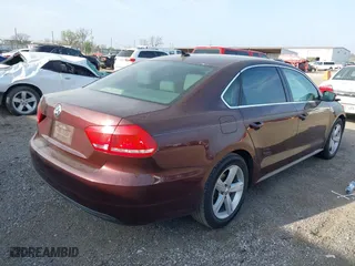 2013 Volkswagen Passat SE w/Sunroof with VIN 1VWBH7A35DC150285, listed as a IAAI auction lot 38970420 with 160,374 mi miles. Bid and sale history available at carsss.com. Image 4.