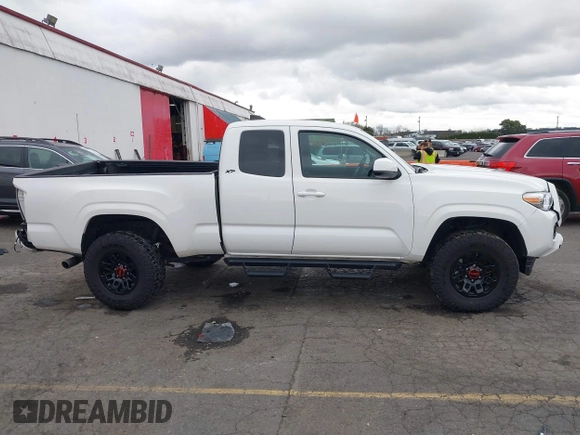 2022 Toyota Tacoma SR with VIN 3TYSX5EN1NT010664, listed as a IAAI auction lot 41642295 with 29,848 mi miles and . Bid and sale history available at DreamBid. Image 14.