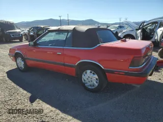 1989 Chrysler LeBaron z VIN 1C3XJ55J9KG275438, wystawiony jako Copart lot #73026764 z przebiegiem 118 347 mil mil oraz Tytuł czysty. Historia ofert i sprzedaży dostępna na DreamBid. Obrazek 2.