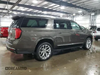 2021 GMC Yukon XL SLT with VIN 1GKS2GKD1MR434218, listed as a Copart auction lot 82777494 with 60,601 mi miles and Salvage Title. Bid and sale history available at carsss.com. Image 3.