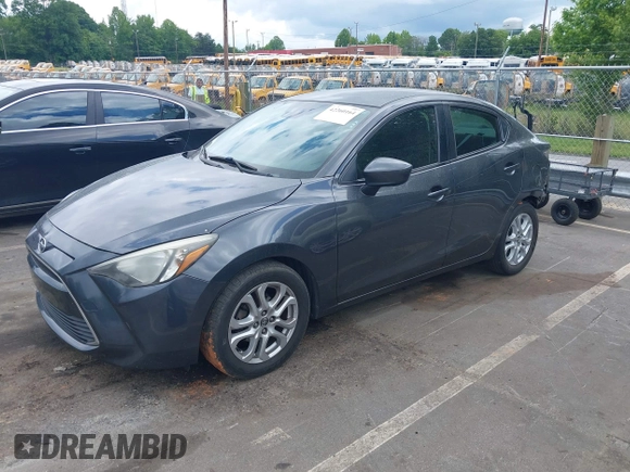 2016 Scion iA z VIN 3MYDLBZV5GY133972, wystawiony jako IAAI lot #42260164 z przebiegiem 156 981 mil mil oraz . Historia ofert i sprzedaży dostępna na DreamBid. Obrazek 18.