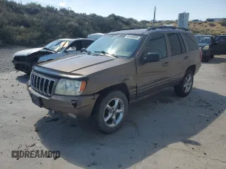 2001 Jeep Grand Cherokee Limited z VIN 1J4GW58N41C625182, wystawiony jako Copart lot #64430095 z przebiegiem 199 322 mil mil oraz Szkoda całkowita • Salvage title. Historia ofert i sprzedaży dostępna na DreamBid. Obrazek 1.