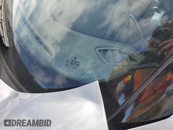 2011 BMW Z4 sDrive35is with VIN WBALM1C50BE633213, listed as a Copart auction lot 61220135 with 62,458 mi miles and Salvage title. Bid and sale history available at DreamBid. Image 5.
