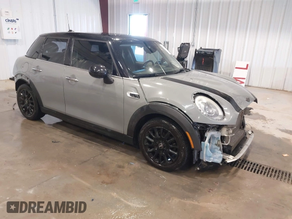 2015 MINI Hardtop 4 Door with VIN WMWXS5C58FT830081, listed as a IAAI auction lot 41345037 with 93,545 mi miles and . Bid and sale history available at DreamBid. Image 1.