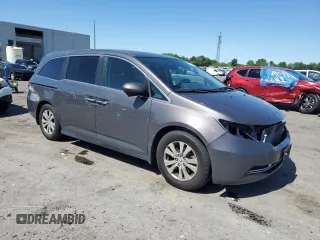 2016 Honda Odyssey EX-L with VIN 5FNRL5H64GB133828, listed as a Copart auction lot 53992655 with 68,905 mi miles and Salvage Title. Bid and sale history available at DreamBid. Image 4.