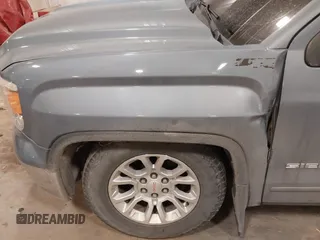 2015 GMC Sierra 1500 SLE z VIN 1GTV2UECXFZ285403, wystawiony jako IAAI lot #41255076 z przebiegiem 71 498 mil mil oraz . Historia ofert i sprzedaży dostępna na DreamBid. Obrazek 6.