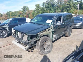 2012 Toyota Tacoma with VIN 5TFPX4ENXCX009676, listed as a IAAI auction lot 40458050 with 101,908 mi miles and . Bid and sale history available at DreamBid. Image 6.