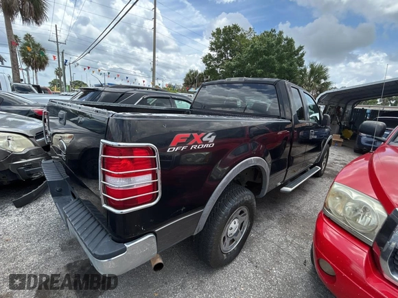2005 Ford F-150 XLT with VIN 1FTPX14585NA13563, listed as a Copart auction lot 63709515 with 248,403 mi miles and Clean title. Bid and sale history available at DreamBid. Image 4.
