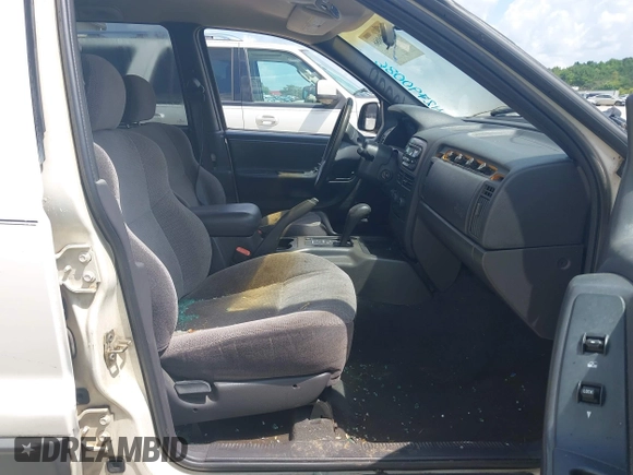 2001 Jeep Grand Cherokee Laredo with VIN 1J4GW48S81C520385, listed as a IAAI auction lot 42790086 with 190,617 mi miles and . Bid and sale history available at DreamBid. Image 5.