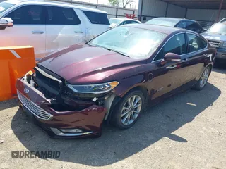 2017 Ford Fusion Titanium with VIN 3FA6P0SU9HR379474, listed as a IAAI auction lot 41979180 with 948,175 mi miles and . Bid and sale history available at DreamBid. Image 2.