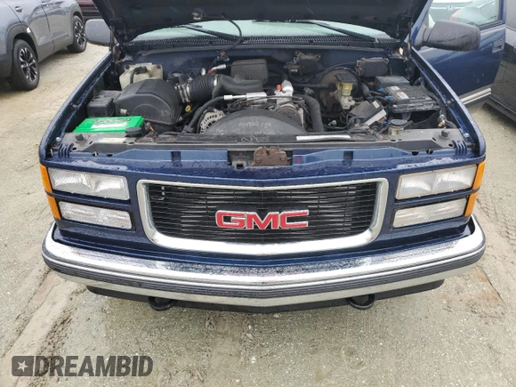 1999 GMC Yukon with VIN 1GKEK13R2XJ739931, listed as a Copart auction lot 74583734 with 115,605 mi miles and Salvage Title. Bid and sale history available at carsss.com. Image 12.