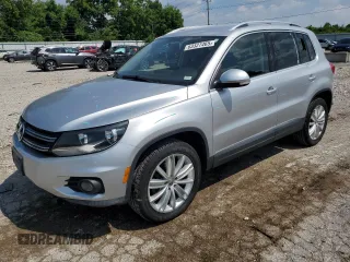 2014 Volkswagen Tiguan SEL with VIN WVGBV3AX5EW544288, listed as a Copart auction lot 63327465 with 55,318 mi miles and Salvage title. Bid and sale history available at DreamBid. Image 1.