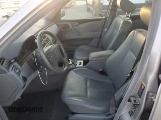 2002 Mercedes-Benz E-Class with VIN WDBJF65J32B498384, listed as a Copart auction lot 77438924 with 0 mi miles and Clean Title. Bid and sale history available at carsss.com. Image 7.