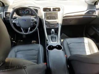 2016 Ford Fusion SE Hybrid with VIN 3FA6P0LU9GR166408, listed as a Copart auction lot 59931995 with 104,560 mi miles and Salvage title. Bid and sale history available at DreamBid. Image 8.