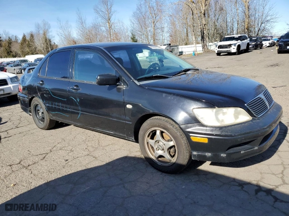 2002 Mitsubishi Lancer OZ-Rally with VIN JA3AJ86E92U027551, listed as a Copart auction lot 45020575 with 214,575 mi miles and Salvage Title. Bid and sale history available at carsss.com. Image 4.