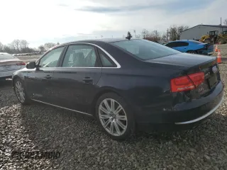 2014 Audi A8 3.0T z VIN WAURGAFD5EN009612, wystawiony jako Copart lot #49860895 z przebiegiem 170 973 mil mil oraz Szkoda całkowita • Salvage title. Historia ofert i sprzedaży dostępna na DreamBid. Obrazek 2.