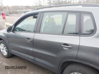 2017 Volkswagen Tiguan S with VIN WVGBV7AX5HK028788, listed as a IAAI auction lot 41699615 with 113,608 mi miles and . Bid and sale history available at DreamBid. Image 14.