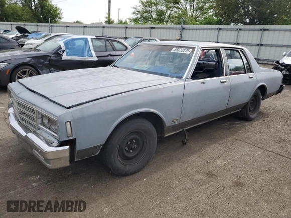 1984 Chevrolet Impala z VIN 2G1AL69H4E9168804, wystawiony jako Copart lot #55232275 z przebiegiem 75 318 mil mil oraz Czysty tytuł • Clean title. Historia ofert i sprzedaży dostępna na DreamBid. Obrazek 1.