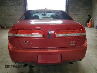 2010 Lincoln MKZ z VIN 3LNHL2JC2AR754092, wystawiony jako Copart lot #56493585 z przebiegiem 84 183 mil mil oraz Szkody całkowita. Historia ofert i sprzedaży dostępna na DreamBid. Obrazek 6.