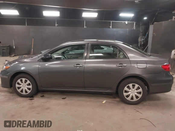 2011 Toyota Corolla L with VIN JTDBU4EE3BJ102060, listed as a IAAI auction lot 42140081 with 125,989 mi miles. Bid and sale history available at carsss.com. Image 14.