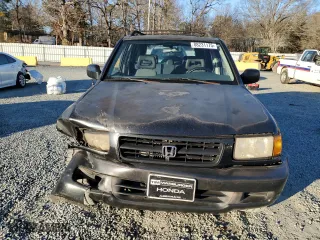 1998 Honda Passport LX with VIN 4S6CM58W7W4419247, listed as a Copart auction lot 88231175 with 194,105 mi miles and Salvage Title. Bid and sale history available at carsss.com. Image 5.