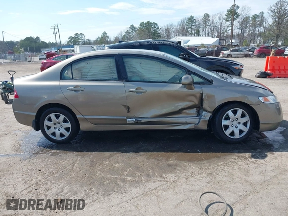 2006 Honda Civic LX with VIN 2HGFA16596H514483, listed as a IAAI auction lot 41889508 with 148,412 mi miles and . Bid and sale history available at DreamBid. Image 13.
