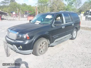2004 Lincoln Navigator Luxury with VIN 5LMFU28RX4LJ15831, listed as a IAAI auction lot 41969032 with 194,600 mi miles. Bid and sale history available at carsss.com. Image 2.