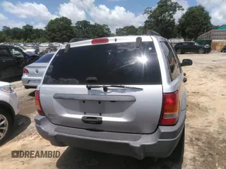 2004 Jeep Grand Cherokee Laredo z VIN 1J4GW48SX4C309998, wystawiony jako IAAI lot #42307167 z przebiegiem 306 912 mil mil oraz . Historia ofert i sprzedaży dostępna na DreamBid. Obrazek 16.