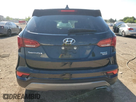 2017 Hyundai Santa Fe 2.4L z VIN 5NMZUDLB1HH034797, wystawiony jako Copart lot #56834465 z przebiegiem 47 528 mil mil oraz Szkoda całkowita • Salvage title. Historia ofert i sprzedaży dostępna na DreamBid. Obrazek 6.