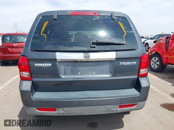 2008 Mazda Tribute ES with VIN 4F2CZ06188KM01024, listed as a IAAI auction lot 41890148 with 122,367 mi miles. Bid and sale history available at carsss.com. Image 16.