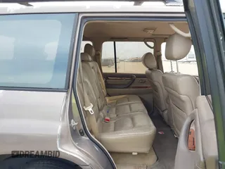 1999 Lexus LX 470 with VIN JT6HT00W8X0068157, listed as a IAAI auction lot 41955366 with 291,014 mi miles and . Bid and sale history available at DreamBid. Image 8.