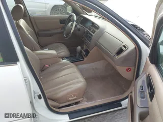 1997 Toyota Avalon XL with VIN 4T1BF12B1VU144017, listed as a IAAI auction lot 41602761 with 163,955 mi miles. Bid and sale history available at carsss.com. Image 5.