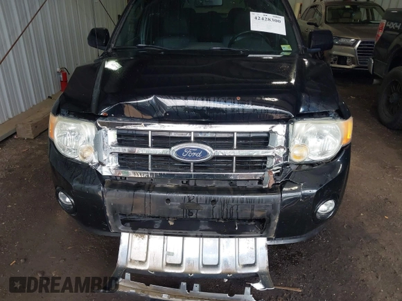 2009 Ford Escape Limited z VIN 1FMCU04G29KA59623, wystawiony jako IAAI lot #42428300 z przebiegiem 115 915 mil mil oraz . Historia ofert i sprzedaży dostępna na DreamBid. Obrazek 10.