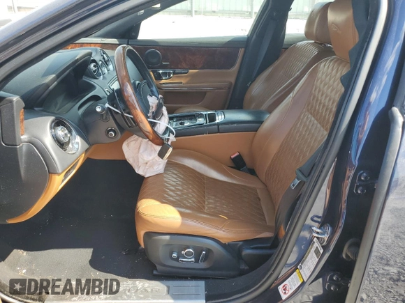 2017 Jaguar XJ with VIN SAJWJ2GD0H8W04917, listed as a Copart auction lot 72507934 with 112,042 mi miles and Salvage Title. Bid and sale history available at carsss.com. Image 7.