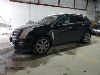 2012 Cadillac SRX Premium Collection z VIN 3GYFNFE31CS653641, wystawiony jako Copart lot #38424094 z przebiegiem 100 677 mil mil oraz Szkoda całkowita • Salvage title. Historia ofert i sprzedaży dostępna na DreamBid. Obrazek 1.