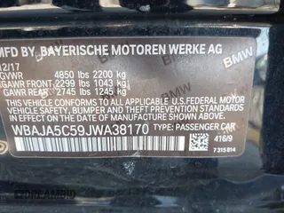 2018 BMW 5 Series 530i with VIN WBAJA5C59JWA38170, listed as a IAAI auction lot 41682219 with 61,990 mi miles and . Bid and sale history available at carsss.com. Image 9.
