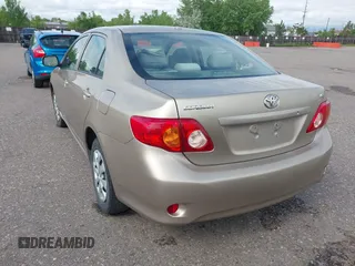 2009 Toyota Corolla with VIN 1NXBU40E09Z078912, listed as a IAAI auction lot 42381759 with 202,353 mi miles and . Bid and sale history available at DreamBid. Image 3.