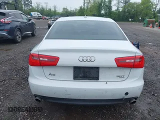 2014 Audi A6 Premium Plus z VIN WAUFGAFC4EN081900, wystawiony jako IAAI lot #42268150 z przebiegiem 150 238 mil mil oraz . Historia ofert i sprzedaży dostępna na DreamBid. Obrazek 16.