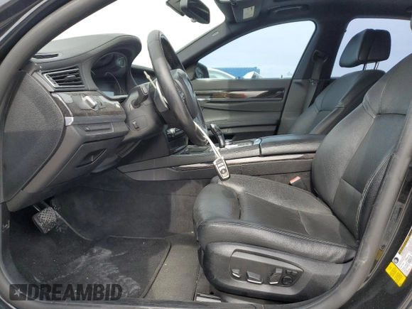 2015 BMW 7 Series 740i with VIN WBAYA6C50FD826727, listed as a Copart auction lot 82197433 with 241,799 mi miles and . Bid and sale history available at DreamBid. Image 7.
