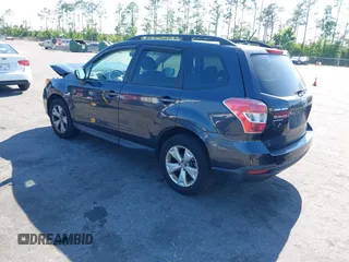 2015 Subaru Forester 2.5i with VIN JF2SJABC6FH823742, listed as a IAAI auction lot 42069857 with 74,966 mi miles. Bid and sale history available at carsss.com. Image 3.