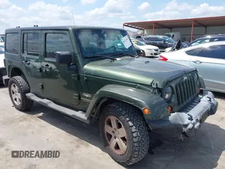 2007 Jeep Wrangler Unlimited Sahara z VIN 1J4GA59137L140194, wystawiony jako IAAI lot #42221496 z przebiegiem 201 790 mil mil oraz . Historia ofert i sprzedaży dostępna na DreamBid. Obrazek 1.
