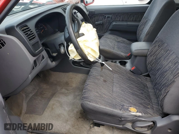 1999 Nissan Frontier XE with VIN 1N6ED26Y3XC304013, listed as a Copart auction lot 81132804 with Not provided miles and Salvage title. Bid and sale history available at DreamBid. Image 7.