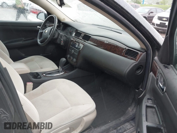 2013 Chevrolet Impala LS with VIN 2G1WF5E32D1149568, listed as a IAAI auction lot 42131854 with 194,934 mi miles and . Bid and sale history available at DreamBid. Image 5.