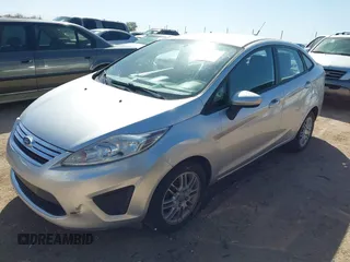 2011 Ford Fiesta SE with VIN 3FADP4BJ4BM177814, listed as a IAAI auction lot 41694964 with 180,565 mi miles. Bid and sale history available at carsss.com. Image 2.