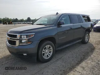 2019 Chevrolet Suburban LT z VIN 1GNSKHKC5KR279203, wystawiony jako Copart lot #57387975 z przebiegiem 73 898 mil mil oraz Szkoda całkowita • Salvage title. Historia ofert i sprzedaży dostępna na DreamBid. Obrazek 1.