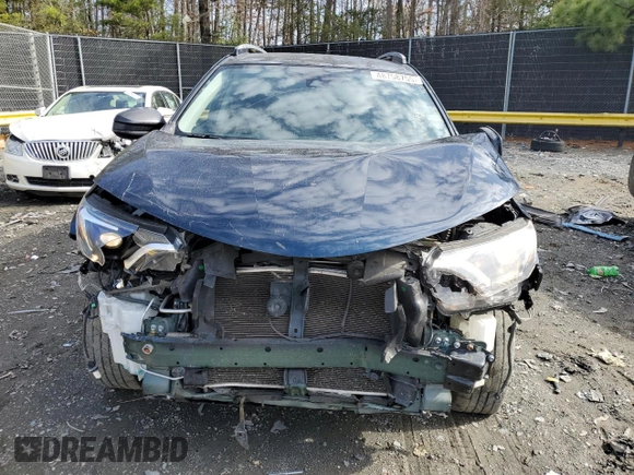 2017 Toyota RAV4 LE with VIN JTMBFREV0HJ109029, listed as a Copart auction lot 48758755 with 104,982 mi miles and Salvage Title. Bid and sale history available at carsss.com. Image 5.