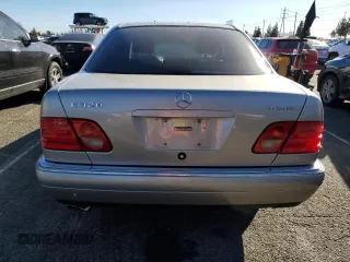 1998 Mercedes-Benz E-Class with VIN WDBJF65FXWA497997, listed as a Copart auction lot 87969125 with 145,322 mi miles and Salvage Title. Bid and sale history available at carsss.com. Image 6.