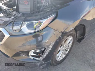 2018 Chevrolet Equinox LS with VIN 2GNAXHEV7J6305532, listed as a IAAI auction lot 41136629 with 180,490 mi miles and . Bid and sale history available at DreamBid. Image 6.
