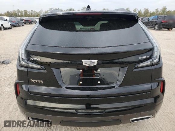 2024 Cadillac XT4 FWD Sport with VIN 1GYFZER46RF213543, listed as a Copart auction lot 83609754 with 3,878 mi miles and Salvage title. Bid and sale history available at DreamBid. Image 6.