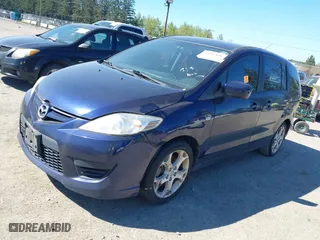 2009 Mazda Mazda5 Sport with VIN JM1CR293090344744, listed as a IAAI auction lot 42042896 with 215,303 mi miles. Bid and sale history available at carsss.com. Image 2.